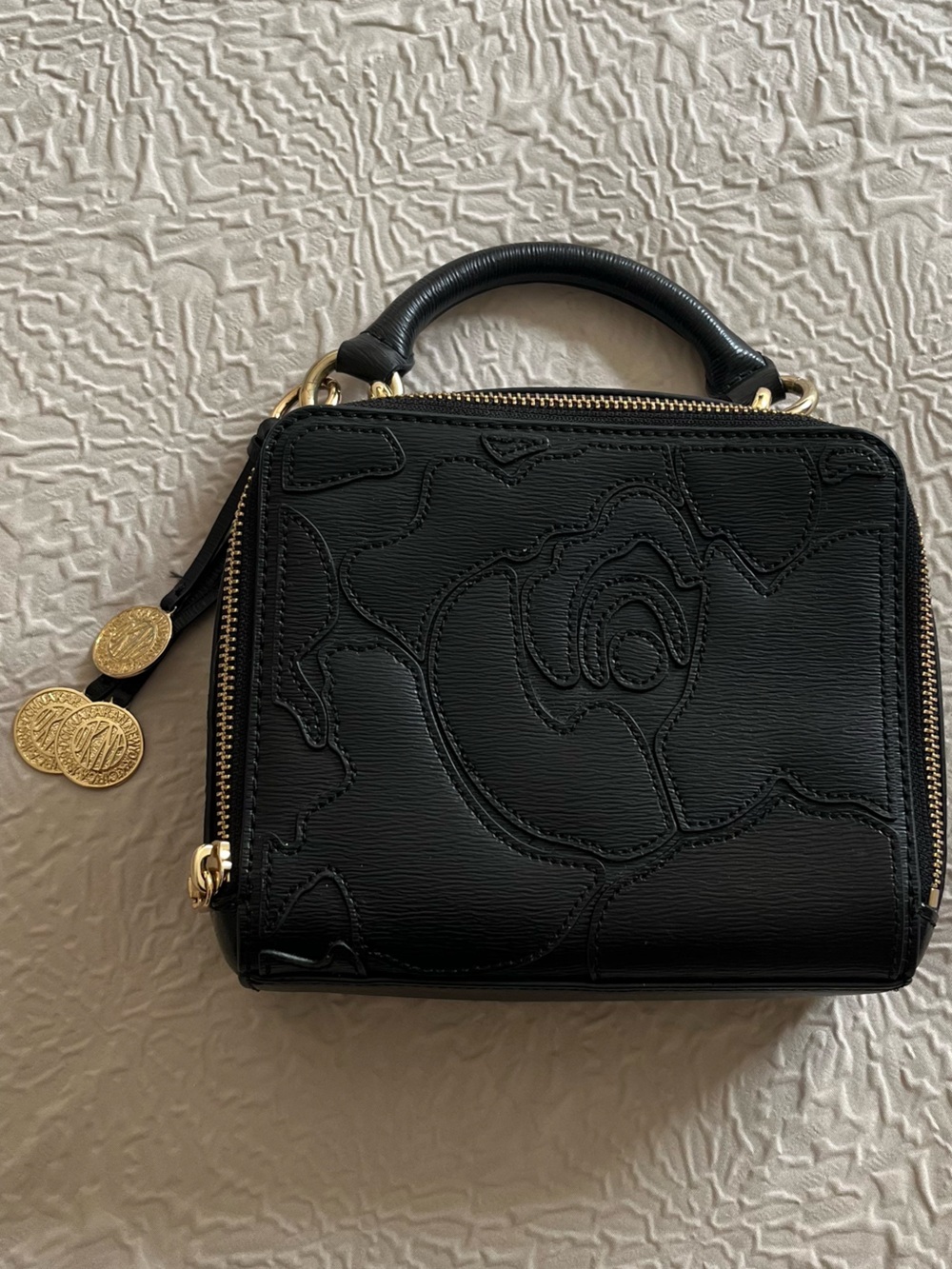 DKNY Black Embossed Floral Mini Top-Handle Bag with Gold Accents